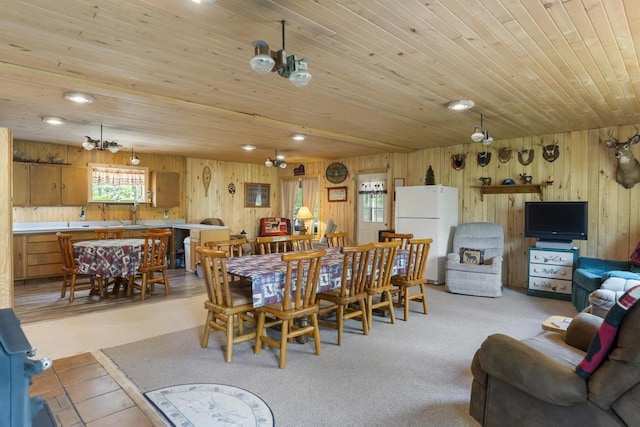 3221 Krause Rd, Petoskey, MI 49770 - dining space featuring wood walls, wooden ceiling, and recessed lighting