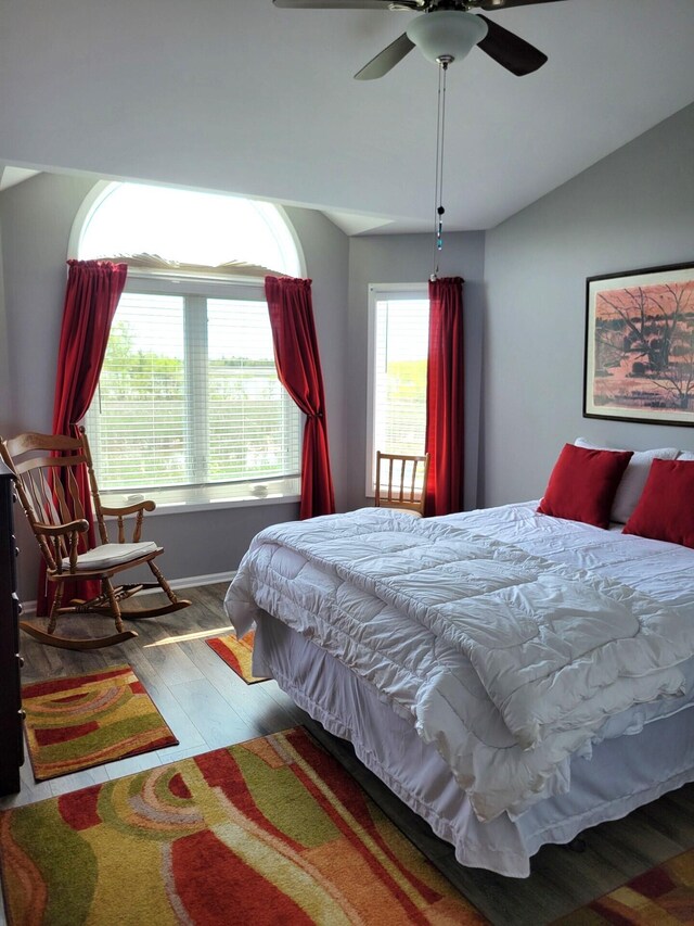 166 Long Rapids Rd, Alpena, MI 49707 - bedroom with wood finished floors and ceiling fan