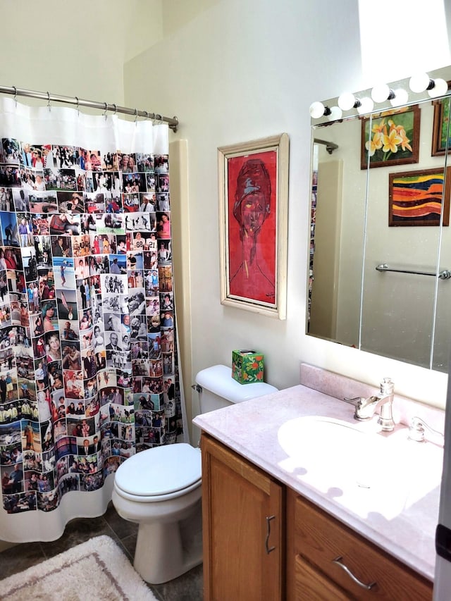 166 Long Rapids Rd, Alpena, MI 49707 - full bath with vanity, toilet, tile patterned flooring, and a shower with shower curtain