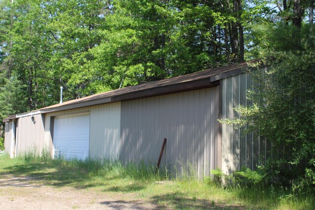 1864 Lenroy Valley Rd, Luzerne, MI 48636 - view of outdoor structure featuring driveway