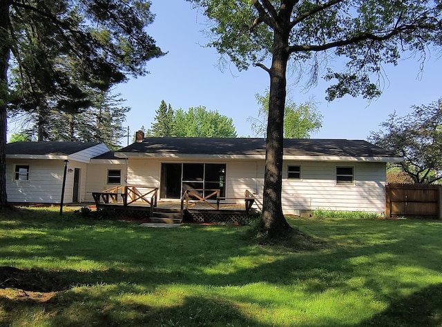206 N Sixth St, Roscommon, MI 48653 - back of property with a wooden deck