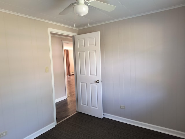206 N Sixth St, Roscommon, MI 48653 - unfurnished room featuring baseboards, a ceiling fan, and crown molding
