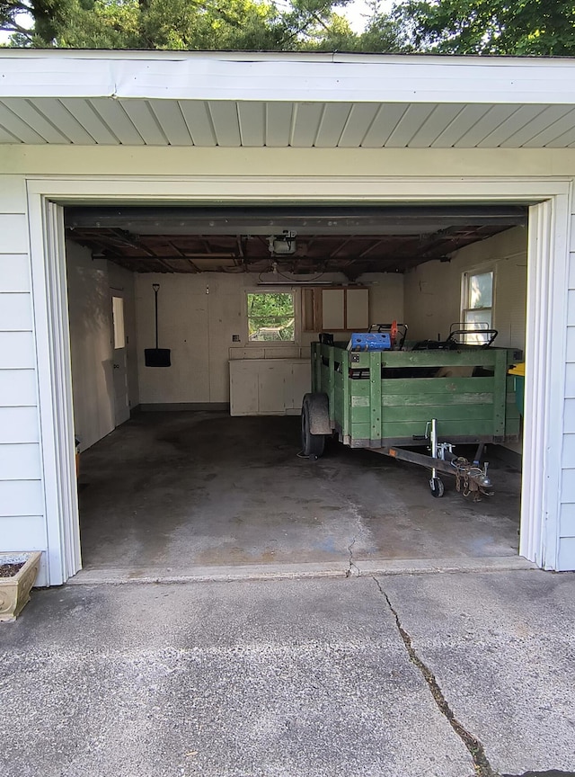 206 N Sixth St, Roscommon, MI 48653 - garage featuring a garage door opener