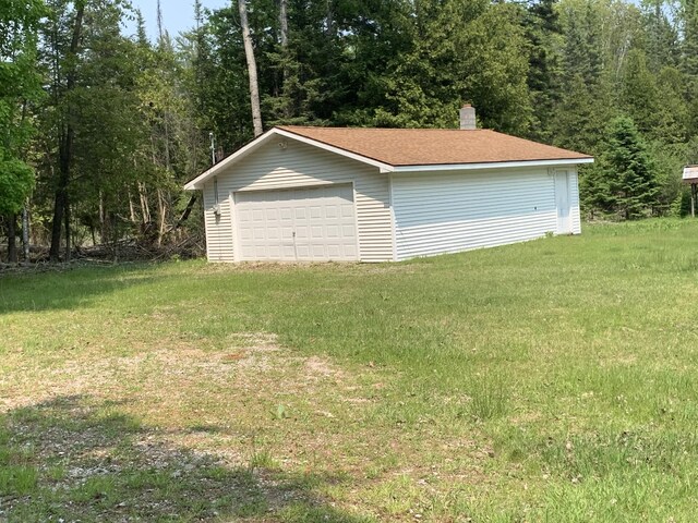 14501 3rd St, Hubbard Lake, MI 49747 - view of detached garage