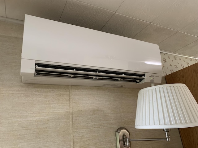 14501 3rd St, Hubbard Lake, MI 49747 - detailed view of a wall mounted AC