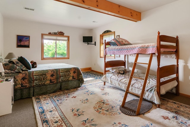 10077 Royal Coachman Trl, Gaylord, MI 49735 - carpeted bedroom with baseboards