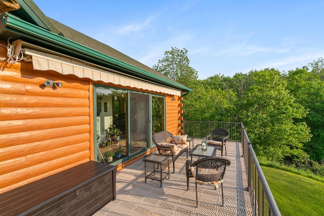 10077 Royal Coachman Trl, Gaylord, MI 49735 - wooden deck with an outdoor living space