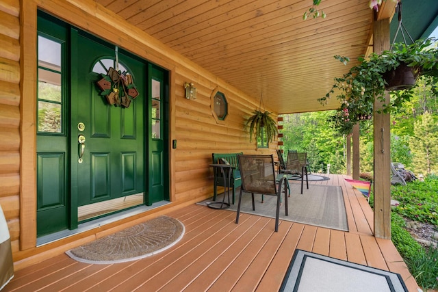 10077 Royal Coachman Trl, Gaylord, MI 49735 - view of wooden porch