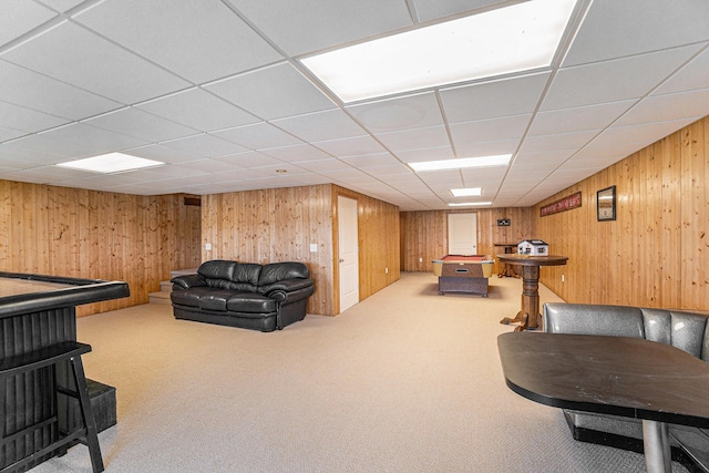 10480 N Straits Hwy, Cheboygan, MI 49721 - recreation room with carpet flooring, wood walls, pool table, and a drop ceiling
