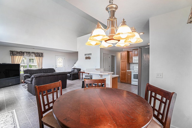 10480 N Straits Hwy, Cheboygan, MI 49721 - dining area featuring a chandelier and light tile patterned floors