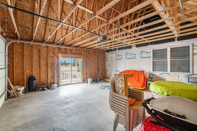 10480 N Straits Hwy, Cheboygan, MI 49721 - garage featuring a garage door opener
