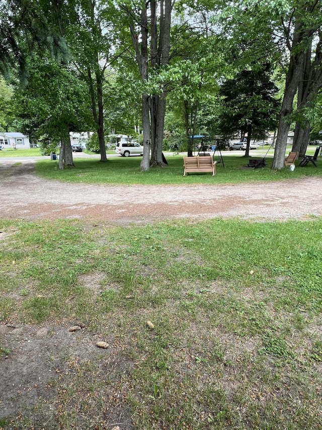 118 Westview Dr, Houghton Lake, MI 48629 - view of grassy yard