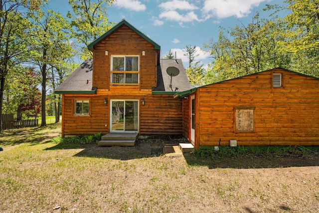 5466 Big Wolf Ln, Lewiston, MI 49756 - rear view of property with a shingled roof