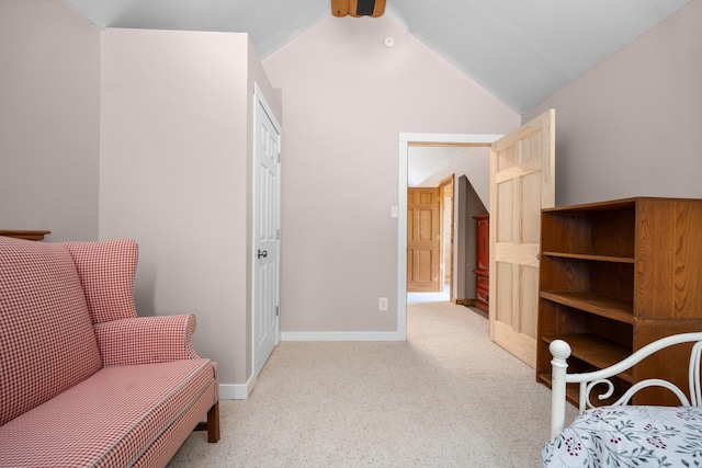 5466 Big Wolf Ln, Lewiston, MI 49756 - sitting room featuring carpet flooring and lofted ceiling