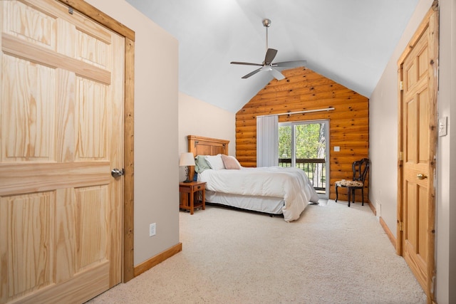 5466 Big Wolf Ln, Lewiston, MI 49756 - carpeted bedroom featuring access to exterior, vaulted ceiling, and ceiling fan