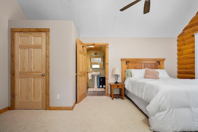 5466 Big Wolf Ln, Lewiston, MI 49756 - carpeted bedroom with baseboards and a ceiling fan