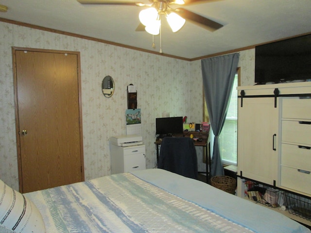 5189 Pinecrest Dr, Lewiston, MI 49756 - bedroom featuring ornamental molding, wallpapered walls, ceiling fan, and a barn door
