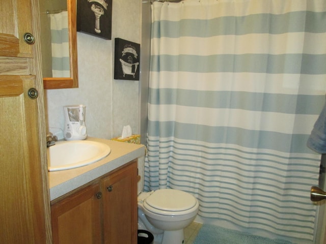 5189 Pinecrest Dr, Lewiston, MI 49756 - bathroom with vanity, toilet, tile patterned flooring, and curtained shower