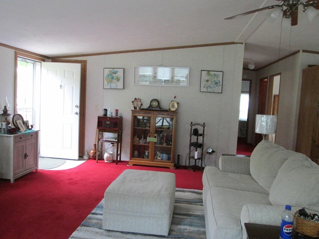 5189 Pinecrest Dr, Lewiston, MI 49756 - carpeted living room with a ceiling fan and vaulted ceiling
