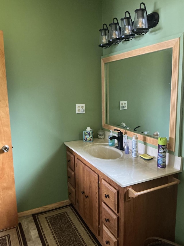 3606 S St, Lupton, MI 48635 - bathroom with vanity and baseboards