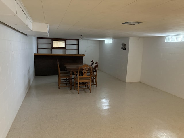 119 Kelly Rd, Alpena, MI 49707 - dining room with a dry bar and tile patterned floors