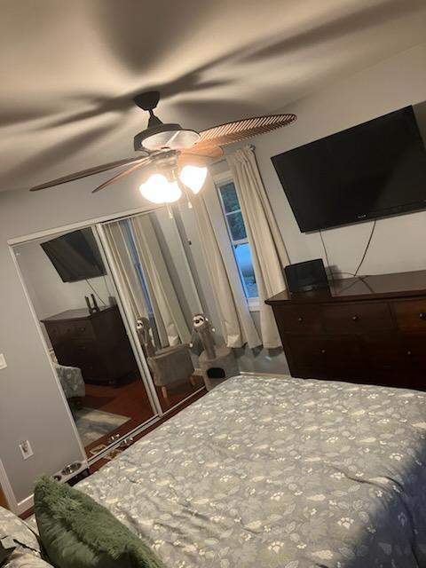 2568 E Mctaggart Dr, Mikado, MI 48745 - bedroom featuring ceiling fan and baseboards