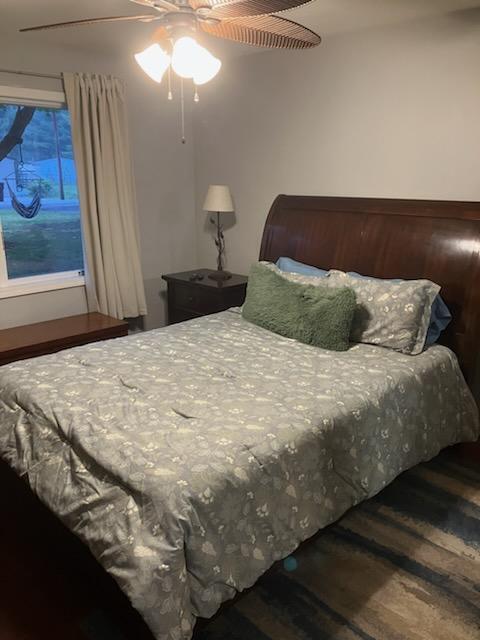 2568 E Mctaggart Dr, Mikado, MI 48745 - bedroom featuring wood finished floors and a ceiling fan