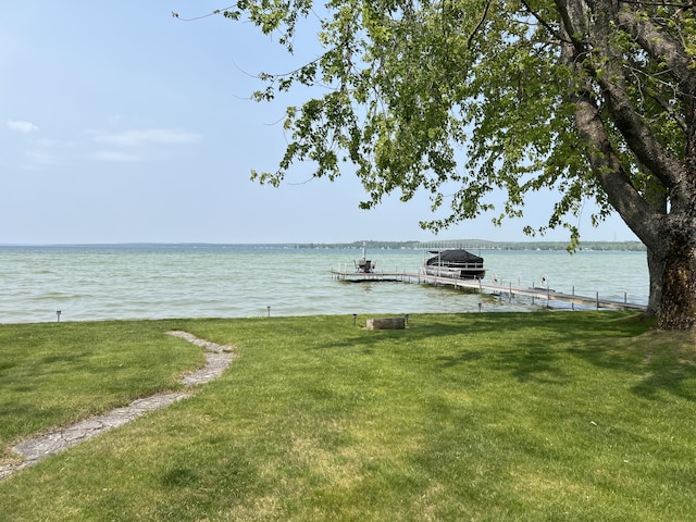 7811 Mcdonald Rd, Cheboygan, MI 49721 - water view featuring a boat dock and boat lift
