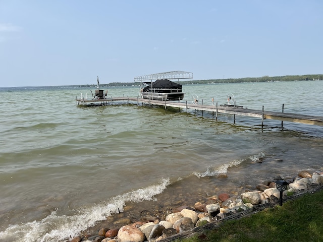 7811 Mcdonald Rd, Cheboygan, MI 49721 - dock with boat lift and a water view