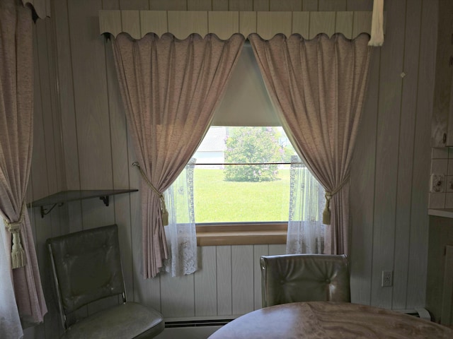 200 S 1st St, Saint Ignace, MI 49781 - bedroom with wooden walls and a baseboard radiator