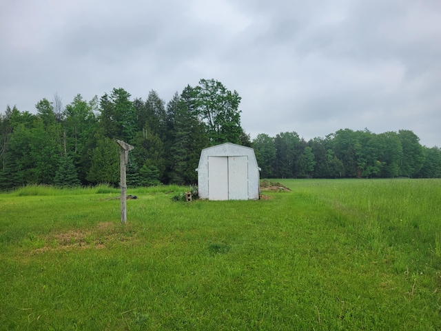 14089 M65, Posen, MI 49776 - view of yard with a view of trees