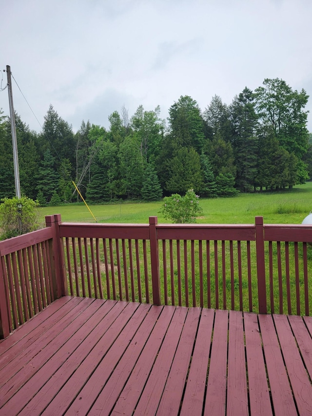 14089 M65, Posen, MI 49776 - wooden terrace featuring a yard