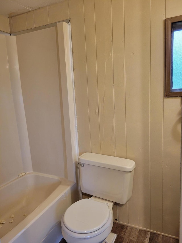 14089 M65, Posen, MI 49776 - bathroom featuring toilet and wood finished floors