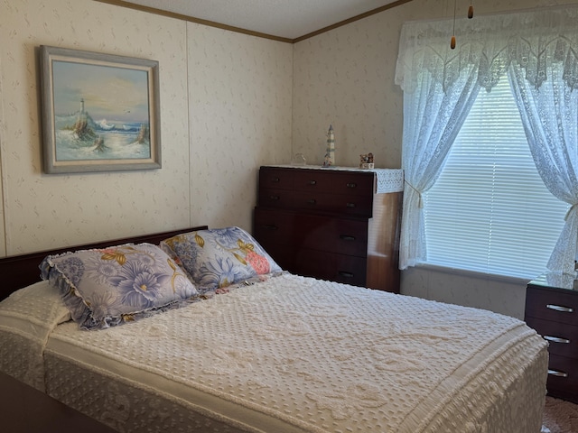 3981 Pointe Dr, Carp Lake, MI 49718 - bedroom with ornamental molding and vaulted ceiling
