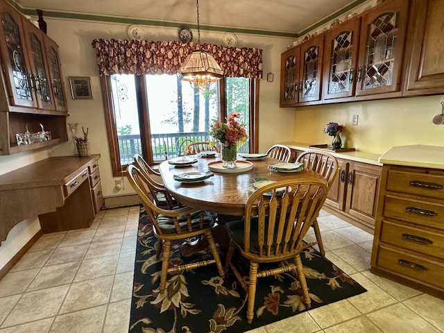 9561 Highbanks Dr, Cheboygan, MI 49721 - dining area with a chandelier, crown molding, and light tile patterned floors