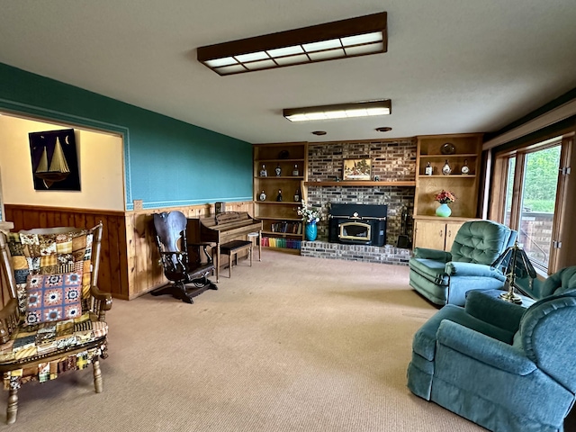 9561 Highbanks Dr, Cheboygan, MI 49721 - living room with carpet, a wainscoted wall, and a brick fireplace
