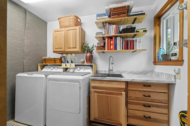 104 Alpena Trl, Houghton Lake, MI 48629 - laundry area with independent washer and dryer and cabinet space