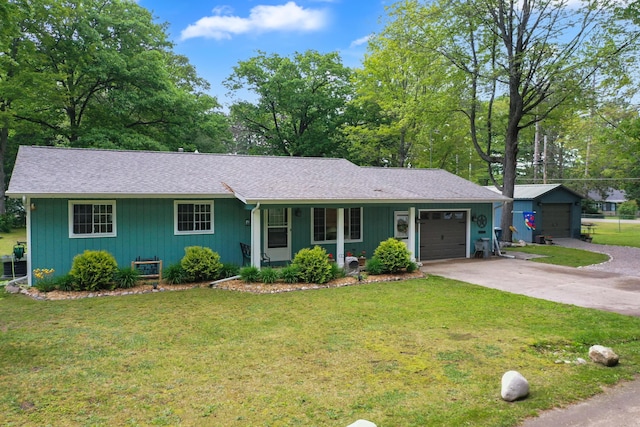 104 Alpena Trl, Houghton Lake, MI 48629 - ranch-style house with an attached garage, a front lawn, driveway, and roof with shingles