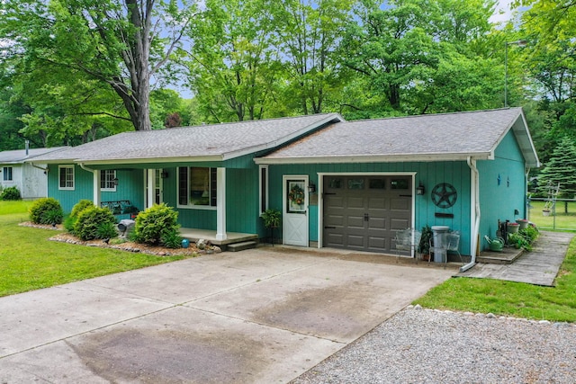 104 Alpena Trl, Houghton Lake, MI 48629 - ranch-style home featuring a garage, a porch, concrete driveway, a front lawn, and a shingled roof
