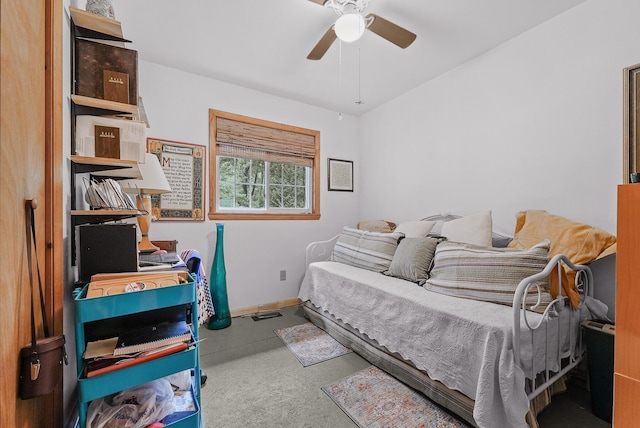 104 Alpena Trl, Houghton Lake, MI 48629 - bedroom featuring baseboards and a ceiling fan