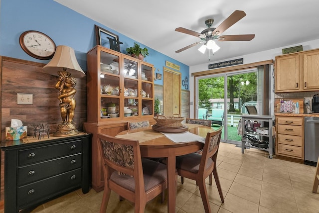 104 Alpena Trl, Houghton Lake, MI 48629 - dining area featuring a ceiling fan and light tile patterned floors