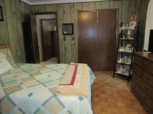110 Chippewa Trl, Prudenville, MI 48651 - bedroom with wood walls and a closet