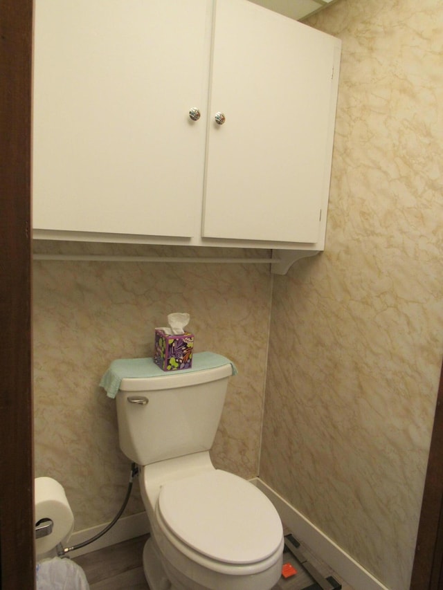 110 Chippewa Trl, Prudenville, MI 48651 - half bath featuring toilet and baseboards