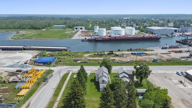 757 N Main St, Cheboygan, MI 49721 - aerial view of a large body of water