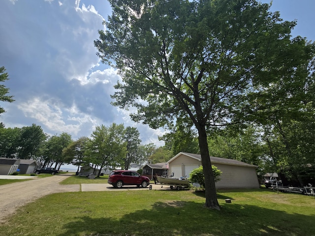 6709C E Houghton Lake Dr, Houghton Lake, MI 48629 - view of grassy yard