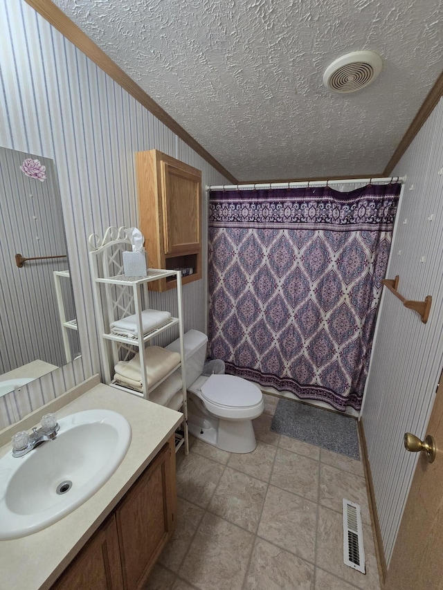 6709C E Houghton Lake Dr, Houghton Lake, MI 48629 - full bathroom featuring ornamental molding, a textured ceiling, vanity, and curtained shower