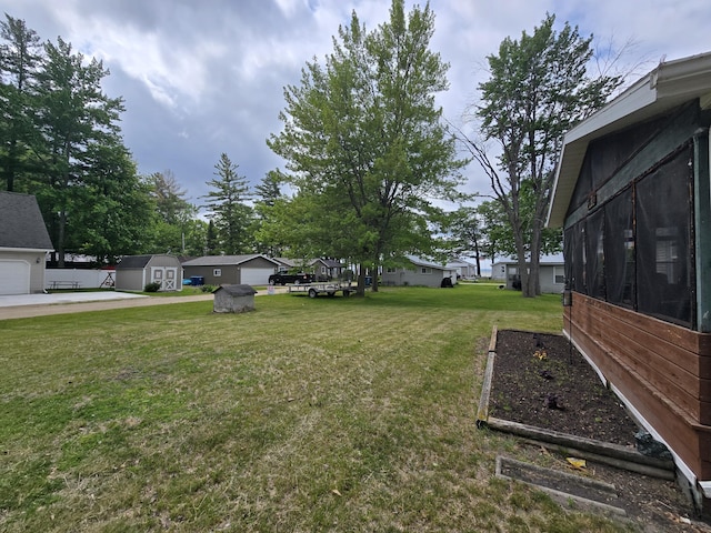 6709C E Houghton Lake Dr, Houghton Lake, MI 48629 - view of grassy yard