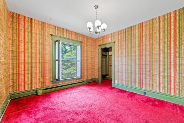 220 E Main St, Gaylord, MI 49735 - carpeted empty room featuring a chandelier and wallpapered walls
