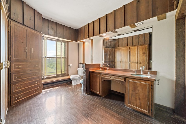 220 E Main St, Gaylord, MI 49735 - office area with a sink and dark wood-style floors