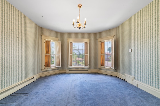 220 E Main St, Gaylord, MI 49735 - empty room with wallpapered walls, a chandelier, and carpet floors